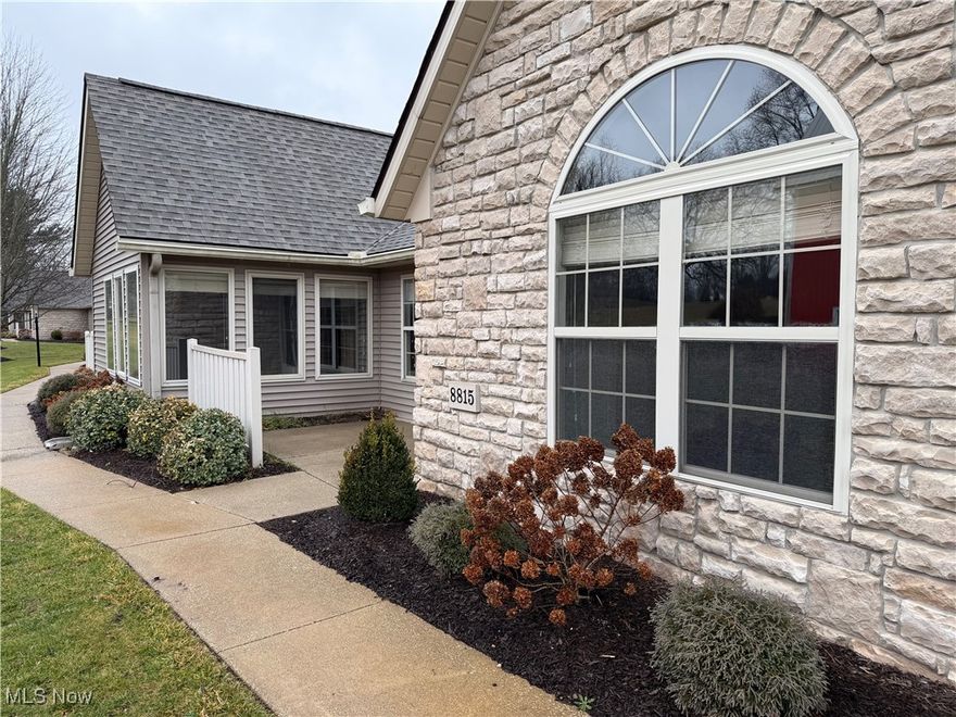 This spacious open concept Scotsbury Green Condo is in a premium location that provides maximum privacy. You enter through your own patio into the huge great room with cathedral ceilings. You have a generous and fully applianced kitchen with plenty of cabinets and counters and a breakfast bar. You can also invite the whole family to eat in this dining room. Mornings will be spent in the 4-season Sunroom enjoying coffee or reading your favorite book. The master suite is complete with its own full bath and a walk-in closet. The 2nd bedroom also has a walk-in closet and access to the sunroom. The laundry room is equipt with a utility sink and the garage is super-sized. Updates include Dishwasher 2018, Air conditioner 2018, Water heater 2019, LVP Flooring 2019, Kitchen sink and faucet 2019, Fridge, Range, Microwave 2021, Roof 2025. Water and Sewer are included in the HOA Fees. This is one you better check out!