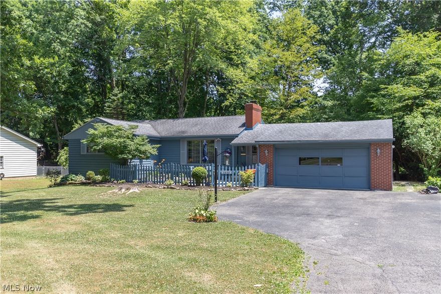 Look at the pictures, have you ever saw a more welcoming place to take a break!! The water bubbling in the pond, the flowers, and the beautiful scenery. 
When you finally make it inside you will see a quality built home. 
Hard wood floors shown and also under all the carpet.. Large eat in Kitchen, Formal Dining Room with Fireplace. Family Room overlooking PRIVATE BACK YARD. 3 nice size bedrooms Master has a walk in closet.
On the lower level you will find a 16x11 hobby work shop, A 20x 14 Rec Room with a Full Bath and it's coming with a POOL TABLE.
And for your added protection a 1 year home warranty.
New Paint and all New Blinds!!!!