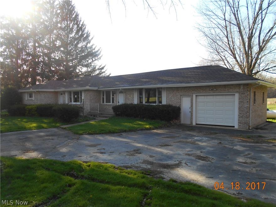 Fantastic opportunity awaits for this 3 bedroom 1.5 bath ranch style home with 1,540 square feet of living space. This home offers great curb appeal with a brick front exterior and new roof.  This home features a new mechanical systems with the furnace and hot water tank.  There is all new exterior doors and garage overhead door.  This home has been freshly painted throughout and new carpeting installed. This home sits on almost an acre of land with a 1 car garage and storage shed included.  This home is looking for a new owner to make it home again.