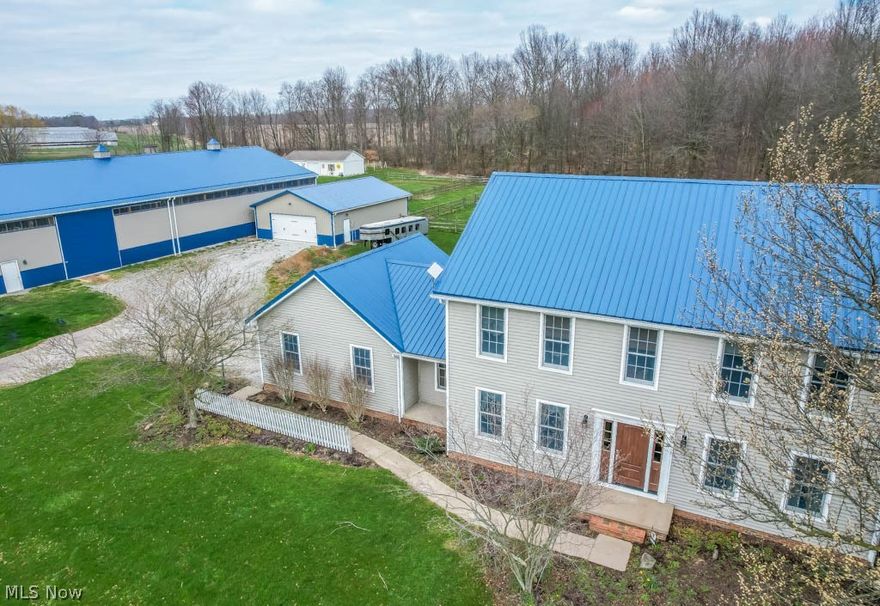 Attention horse owners! Your dream property awaits with this 4 bedroom home on 3+ acres, complete with two outbuildings tailor made for your horses! Step inside the center hall colonial to discover a cozy foyer leading to a living room with a fireplace and a formal dining room featuring a tray ceiling with crown molding. The kitchen offers ample cabinetry, stainless steel appliances, a center island with a cooktop, and a dinette with access to the rear deck overlooking a pergola-covered patio with a firepit. Convenient 1st floor laundry and a guest bath complete this level. Upstairs, find all bedrooms, including a master suite with a fireplace, full bath, and walk-in closet. The secondary bedrooms share a full bath in the hall. Additional living space awaits in the full basement, ideal for a rec room and a bonus room that could be used as an office or 5th bedroom. Outside, enjoy the rural setting with a 30' x 40' garage, a 56' x 120' horse barn with 3 stalls, a feed room, and an arena plus a 60' x 135' fenced pasture! Cherished by the same family for nearly 20 years, this property has been well-maintained with newer flooring, roof, HVAC, and more. Don't miss this once-in-a-lifetime opportunity; call today!