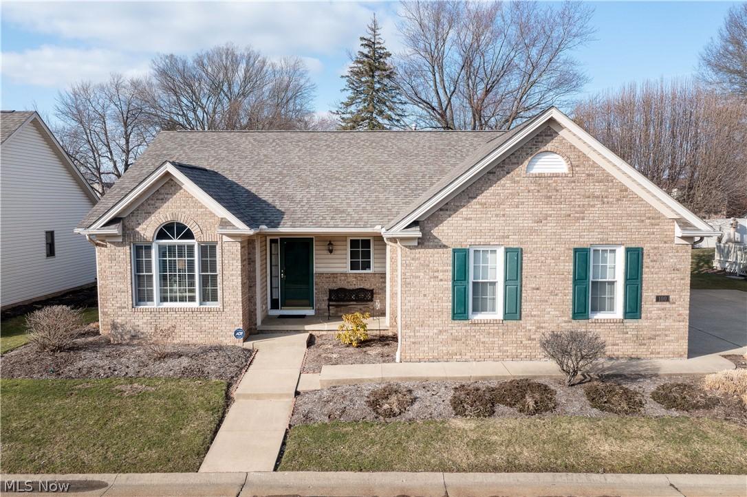 This fantastic free-standing condominium is located right in the heart of North Canton. Excellent floor plan, quality, meticulous care, and many updates! This beautiful home features a recently updated eat-in kitchen with plenty of cabinets space, Quartz countertops, stainless appliances, a subway tile backsplash, a built-in desk, laminate floors, and a dinette area with lots of natural light. -A great room with a lovely gas fireplace, vaulted ceiling, and french doors to the screened patio (14x60) and deck perfect for relaxing and enjoying. The master bedroom has a master bath with double sinks, a standing shower & a walk-in closet (12x7); also, there is an office or sitting area off this bedroom. A 2nd bedroom, full bath, and a convenient 1st-floor laundry room with overhead cabinets, a walk-in closet, and a utility sink complete the main floor. Downstairs is partially finished and offers an L-shaped recreation room, recessed lights, glass blocks windows, a workshop area, and an abun