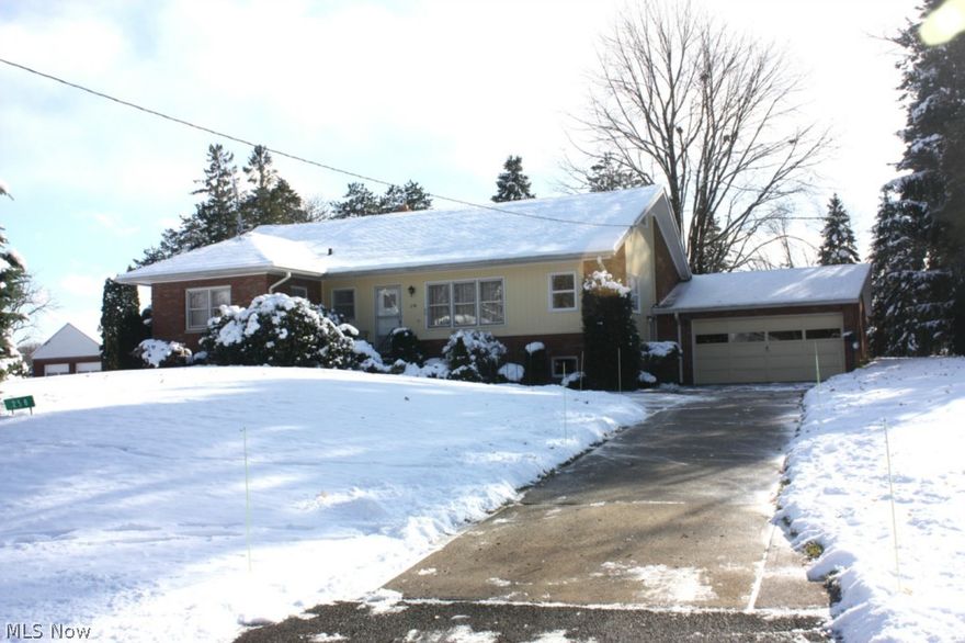 Clean and crisp one owner home in Washington Twp. - Owner designed, assorted German light fixtures.  Beautiful view from dining room and living room to rear walkout to covered rear patio.  Home is elevated nice on 100' x 258' lot with rear tree line.  Full divided glazed tile basement, great family room area, workshop/hobby area!