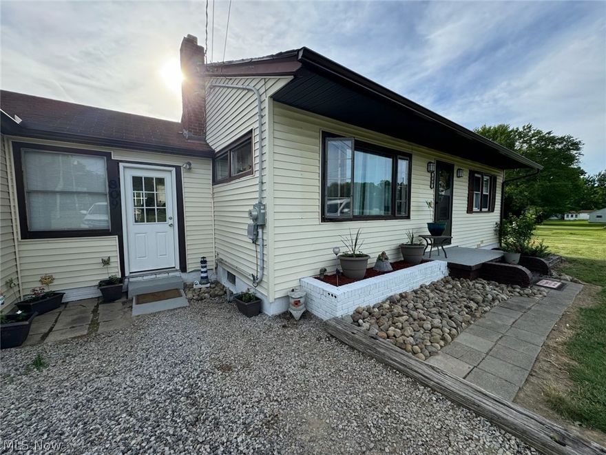 Very cute ranch perfect for a starter or downsizing.  Cheaper than rent.  Wood walls in heated breezeway where you can also do laundry on the first floor that attaches to the 1 car garage.  Relax on the deck and a walkway out to have those summer night fires.  Quiet area in LaBrae school district.  New septic in October '25.