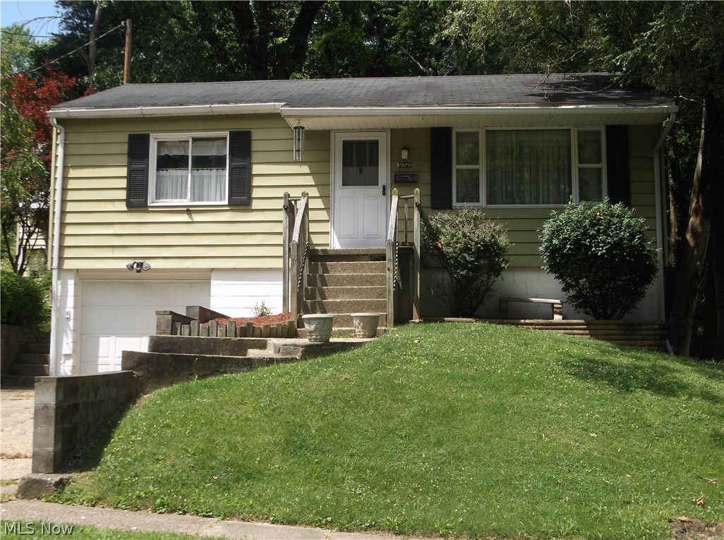 Nice 3 bedroom home in North end. Private back yard with covered deck. 1 car basement garage. Some knotty pine walls. Washer dryer hookup in the basement. Range,refrigerator, washer, and dryer stay.Move in ready.