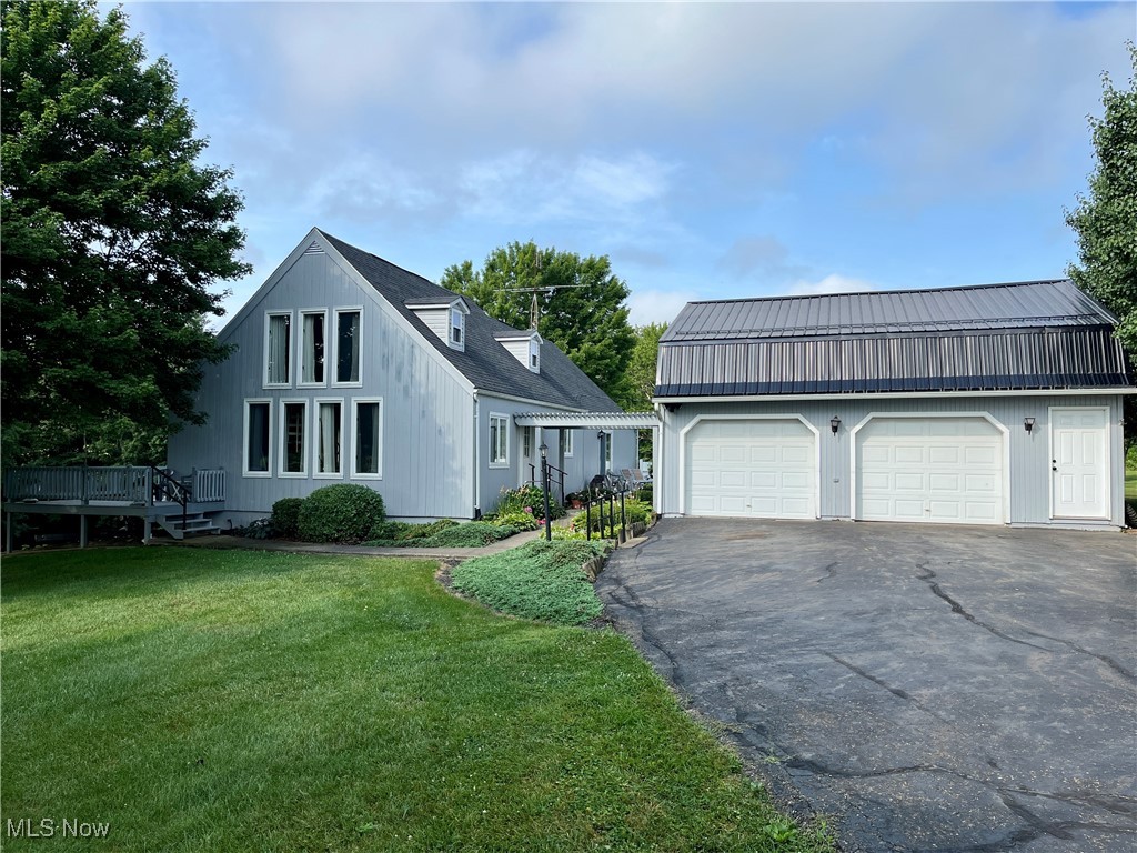 42 Acre Farm - 1,600+ SF Home - Marketable Timber. Capitalize on this opportunity in Washington Twp., Carroll County, OH. This well-maintained property features a 2-bedroom, 2-full bath home with 1,665 sq. ft. of living space. Main floor master bedroom with a walk-in closet. Updated central air, propane FA furnace, and 200-amp breaker electric. Good, shingled roof and blacktop driveway. The detached 2-car garage and machinery barn provide ample storage space. Nicely diversified between crop land and recreational opportunities. Approximately 12.5 acres of tillable land. The wooded land features a 10-acre stand of mature timber, with a healthy population of white oak. A small stream runs through the property. Mineral Rights and Royalties do not transfer. Buy the entire 80-acre farm, or the home and outbuildings on 42 acres. NOTE: 80.2-acre farm with updated farmhouse and old bank barn offered as an entirety for $1,100,000 or purchase home and barn on 42.2 acres for $650,000.