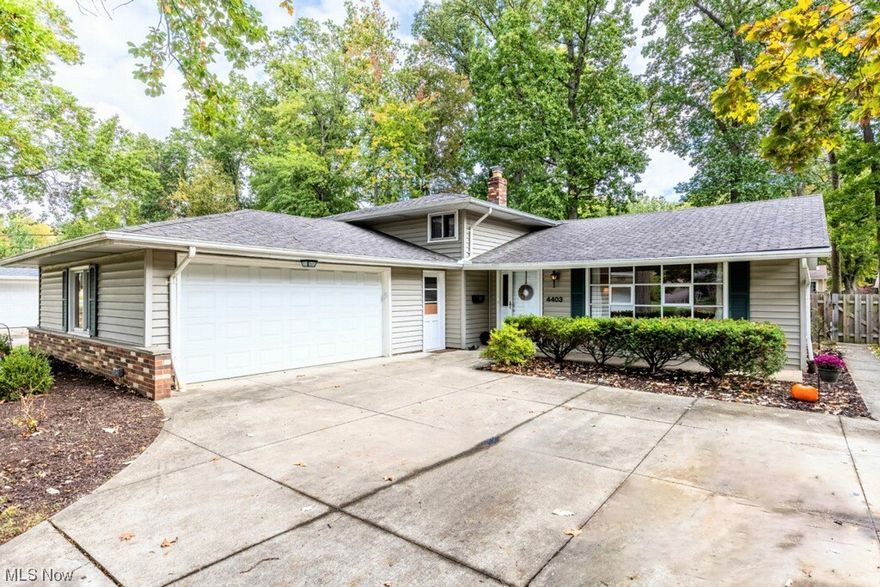 Prepare to be Moved! This spacious split level home is the perfect place for you to call home. The main level offers fresh paint, a large bay window in the living room, a dining space with updated lighting, and an eat-in kitchen with a skylight. The lower level is a great place to gather and offers a family room with a full wall fireplace, lots of windows, and a door leading out to the patio. You'll also find a huge laundry room with extra space for office, exercise equipment, or storage and a full bath. Upstairs, you will find four bedrooms with refinished hardwood floors and the primary suite has its own private bathroom. Located in a lovely neighborhood with a great sense of community, you'll be close to shopping, highway access, and Metroparks. Enjoy the peace of mind that comes with a fully fenced big and sunny back yard and a patio area overlooking the tree-lined yard. Updates include main floor fresh paint (23'), SS stove & dishwasher (21'), upstairs hall bathroom renovated (20'), backyard landscaping (20'), full wood fence (19'), and refinished hardwood (19'). One year warranty being offered! With 2,400 square feet and 4 bedrooms, 3 bathrooms, and an attached 2-car garage, this home is sure to be snatched up quickly. Make an appointment today to see this beautiful home and start making memories that will last a lifetime!