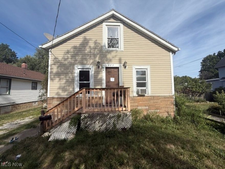 Welcome to 877 Bertha Ave — a charming Cape Cod located on Akron’s East Side with loads of potential! This 3-bedroom, 1-bath home offers 866 square feet of opportunity, whether you're a first-time buyer looking to build equity or an investor seeking your next project. Inside, you'll find a functional layout with a cozy living room, dedicated dining area, and three nicely sized bedrooms — including two tucked upstairs beneath classic Cape-style sloped ceilings. The kitchen is spacious and ready for your updates, with a large window overlooking the fenced backyard. Vinyl windows and a newer roof provide peace of mind for big-ticket items. Outside, enjoy a covered back patio perfect for relaxing or entertaining, along with a generous .13-acre lot and off-street parking. Located just minutes from I-77, shopping, and dining, this home blends convenience with value. Bring your vision and tools — this property is mostly cosmetic and ready for your finishing touch. Don’t miss out on this affordable opportunity in Akron!