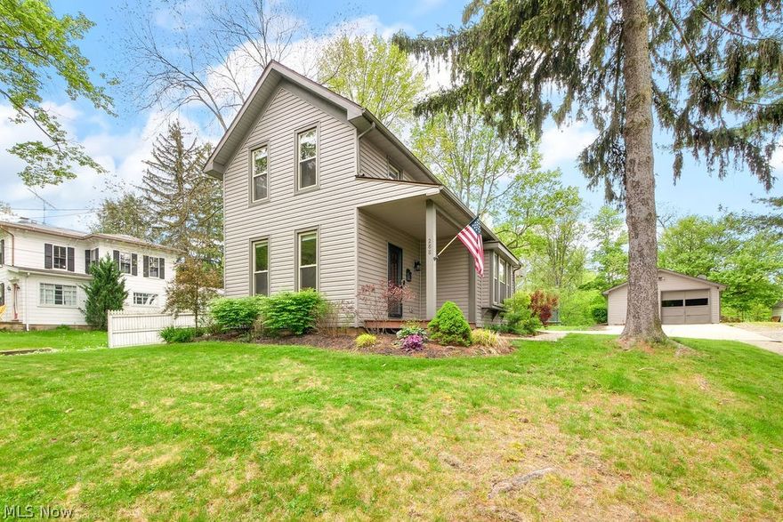 Experience the charm and convenience of this updated 3-bedroom colonial. Renovated within the last seven years. The open-concept main level features a modern kitchen equipped with stainless steel appliances, custom cabinetry, and elegant real hardwood floors that extend into the dining area. The interior is bathed in natural light thanks to upgraded vinyl windows, creating a warm and inviting atmosphere throughout. The layout includes a convenient laundry room and a bedroom adjacent to the full bathroom on the main floor. Up the extra-wide staircase, you will find two additional bedrooms, perfect for family, guests, or a home office. Outside, a concrete patio provides an excellent space for outdoor relaxing and is seamlessly connected to the driveway and a 1.5-car garage. The property includes an expansive private backyard, ideal for leisure and activities. Located near historic downtown, this home offers easy access to unique shopping, dining, and cultural experiences. With ample storage in the basement, this home combines modern updates with classic charm.