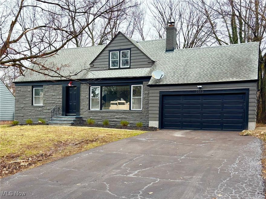 Rare find! Spacious updated home, deep yard, nice layout and -wow- 4 bedrooms and 2 full baths! First floor features an open floor plan with a gourmet kitchen, high end soft close cabinets, calacatta quartz countertops, Samsung smart stainless steel appliances, luxury vinyl flooring, recessed lighting and a custom fireplace for warm cozy nights. The first floor has 2 bedrooms, a sunroom and a full bath with a walk-in tiled shower and a sliding glass door. Second floor features 2 more spacious bedrooms with plenty of closet space and tiled full bath. The gigantic basement is perfect for entertaining with a glass block windows and recessed lighting. The attached oversized garage has access to a deep back yard and patio. Amazing location with privacy and a terrific floor plan.