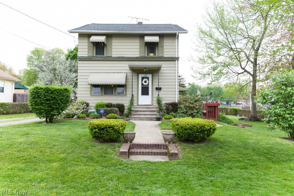 This 3 bedroom home with 1,000+ sq. ft. features an updated kitchen and bathroom, a separate dinning room and breakfast nook, and a large back deck overlooking the beautifully landscaped yard. The first floor has fresh carpet throughout and an open and airy floor plan. 1 full bathroom upstairs and a second full bath in the basement. This home is very clean with neutral paint, a newer roof, and a large corner lot. There is a 1 car detached garage with a carport to cover a second car. Rest easily because the sellers are providing a 1 year home warranty. Updates include new flooring in the kitchen, newer stove and dishwasher and a new garage door. Call today to setup your private tour!