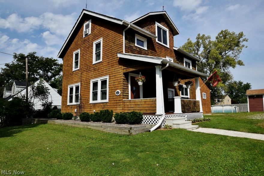 Pristine Century Colonial Built in 1873  ... Beautiful Park-like Setting With Impressive Deep Setback ... Loaded With Old World Charm, Quality and Character ... 4 True Bedrooms ... 2 Full Baths .... Sparkling Hardwood Floors ... Huge Living Room  ... Spacious Dining  Room With Gorgeous Lead Glass Built-in Cabinets ... Large Country Kitchen With Lots Of Counter and Cabinet Space ... Plus, A Walk In Pantry ....Lots Of Natural Light and Energy .... First Floor Utility ... Beautifully Finished 3rd Floor ... Recreation Room ... Lots Of Storage ... Newer Windows ... Many Expensive Improvements ... Two Car Garage ..
