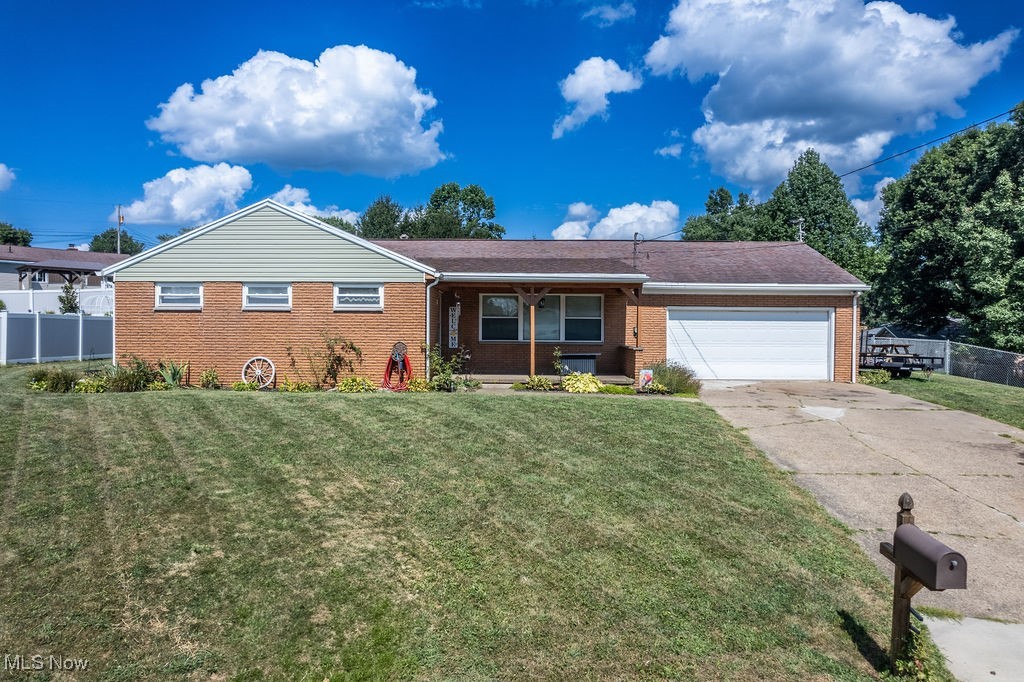 This spacious brick ranch provides all you need in one floor living. The main level offers a large living and dining area, kitchen with ample space, 2 full baths, and 4 bedrooms. The owner’s suite features a remodeled bathroom. Storage on this floor is made easy with 4 hall closets. The layout flows nicely with hardwood flooring throughout. Laundry is conveniently located in the attached garage, which opens to a workshop complete with workbenches. The unfinished basement provides endless possibilities as it is the entire size of the house. Outside you find a paved patio in a huge fenced in backyard. All centrally located in a south side neighborhood. Call your real estate professional for a tour today!