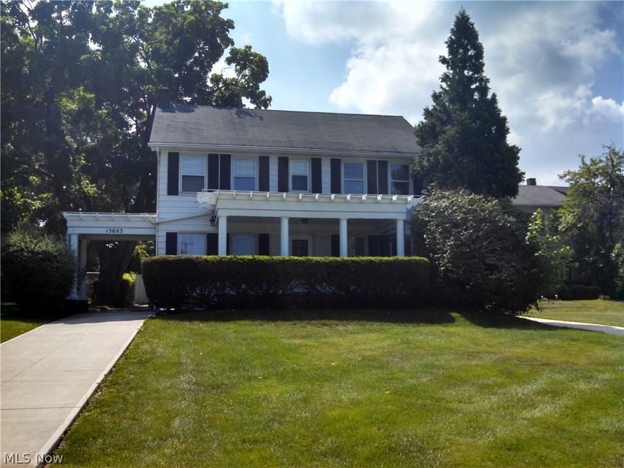 Timeless Lakewood Colonial offers Charm + Quality Of Yesteryear! Wonderful front and back porches! Foyer with guest closet greets you.  Elegant Living Rm features gas log burning FP with leaded stain glass book shelves, fresh paint and hardwood floors.  Formal DR with lead stain glass cabinet also has HDWD floors and leads to updated kitchen with SS appls & 1st fl half bath.  Gorgeous staircase leads to 2nd floor & features huge master bedroom with two closets and window seat! Updated full bath, two more bedrooms and large linen closet! Finished 3rd floor was bedroom but now storage area. New cement driveway 2013! Updated furnace and C/A! Large deep lot with great patio area to entertain! Finished lower level with bar. 2 ½ car garage.