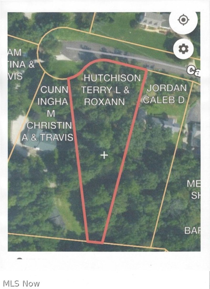 Very nice 1 acre building lot on Carol Lane, Mitchell Hill Road, Dresden. Attractive, wooded lot on quiet cul-de-sac in Tri-Valley School District with utilities available. Lot 17 Mitchell Hill Subdivision. Heavy wooded lot with mature trees, pathway to back of the lot and a very unique hand laid stone bridge, crossing the ravine. Excellent opportunity to build your dream home in a quiet, attractive neighborhood.  Restrictions apply.
