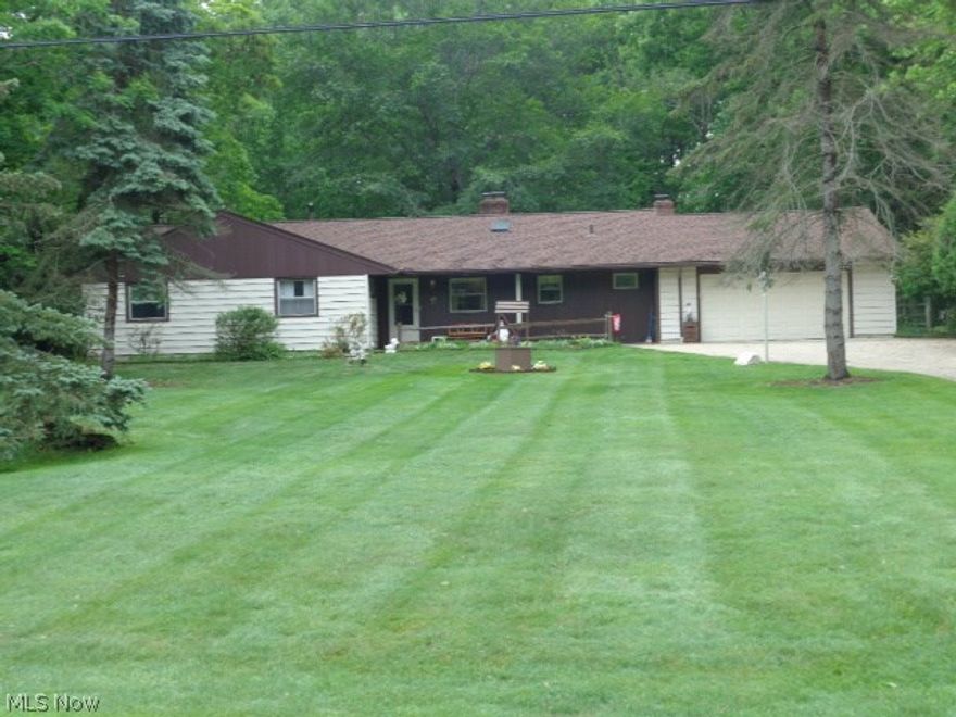 Spacious Four Bedroom Ranch on over an Acre lot!!Same Owner for 36+ years!!Large room sizes!!Deck overlooks wooded back yard!!Replacement Windows!!Fireplace in the living rm!!shed!!Attached garage(598 sq ft)!!Long 10 yr old concrete driveway!!Approx 15 yr old kitchen!!Wide driveway!!Private lot!!Not many like this one in Parma---Don't Miss Out!!