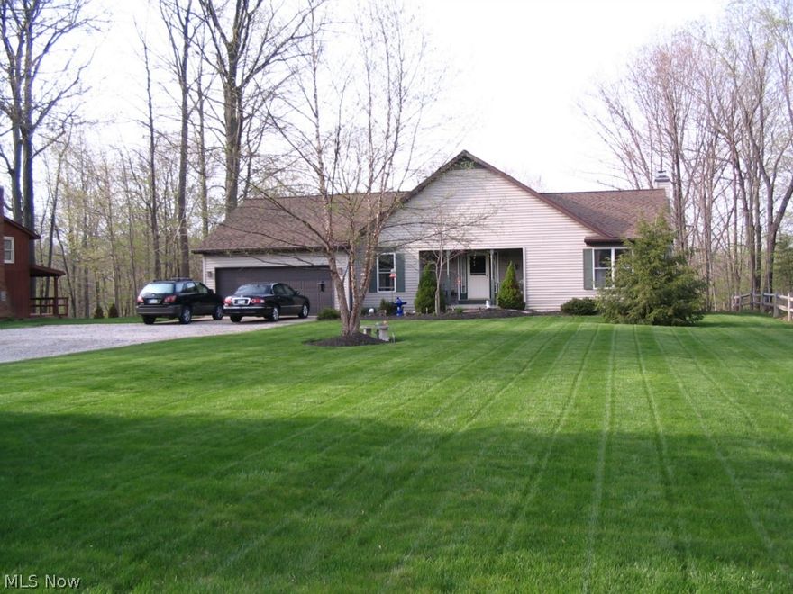 Situated in Carlisle Township on a scenic river lot sits this meticulously maintained ranch style home. It has a walk-out finished basement with a beautiful built-in bar, huge rec room, dining area, full bath. This leads out to a patio over looking a scenic river view. Home built in 2001 features Anderson windows, hickory kitchen cabinets. It has super low utility bills with a geothermal system.