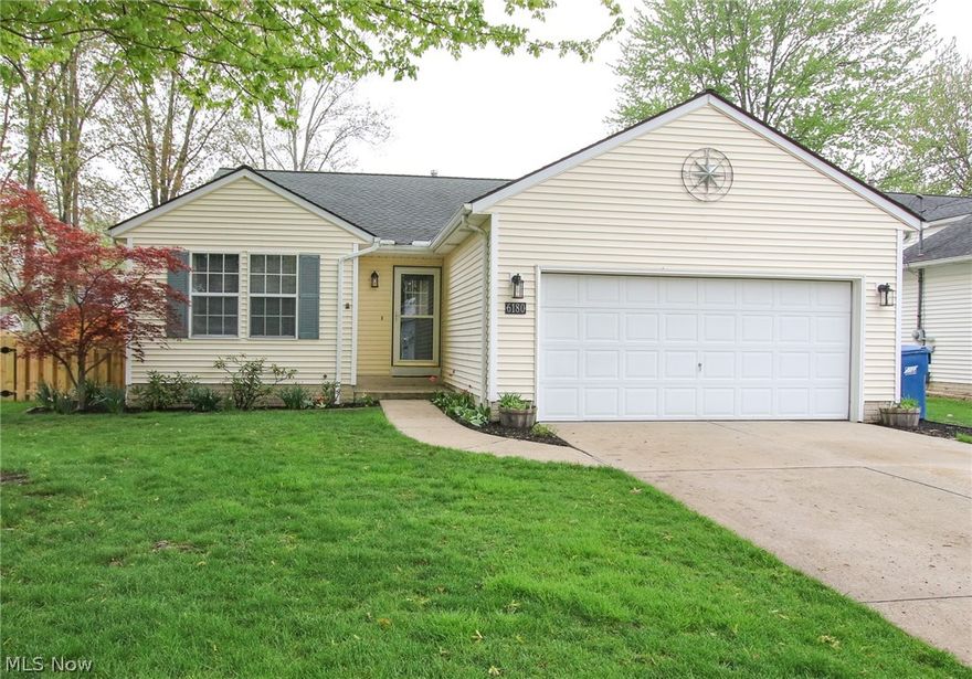 Welcome home to this beautiful, well-maintained ranch located in one of North Ridgeville's most desirable neighborhoods. The pride of ownership shows throughout this 3 bedroom, 2 bath home that has been meticulously taken care of. The great room has cathedral ceilings and a gas fireplace open to the kitchen and dining area creating a large gathering space that's perfect for a get together with family and friends. The master suite boasts large closets with a master bath complete with double sinks and built-ins for extra storage. The kitchen has a newer stove, microwave and garbage disposal that are included with the sale of the home. The washer and dryer, which is conveniently located on the first-floor laundry room with tons of storage are included. Basement was remodeled in 2014 for additional living space. The possibilities are endless in this bonus area. (New hot water tank, sump pump with new battery for backup added in 2014). This home is situated on 4 parcels to give you extra ou