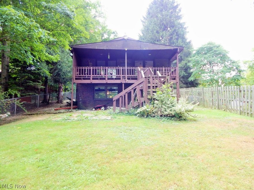 Lake front property with an incredible view of Meadowbrook Lake. This 2/3 bedroom home is move in condition with 3 full baths. Finished walkout basement with full bath can easily be 3rd bedroom as well as additional family room.  Master bedroom has private bath with walk in shower. New furnace and central air. Laundry Room is enclosed from the rest of the finished basement. All appliances are newer as well as carpet. The 2 sets of French doors open to the multi tiered deck off the kitchen and living room. The oversized 2 car garage with concrete drive is just a big plus. Boat and fish to your hearts content or just sit on your deck and enjoy the view... Won't last!! Priced to sell !!!