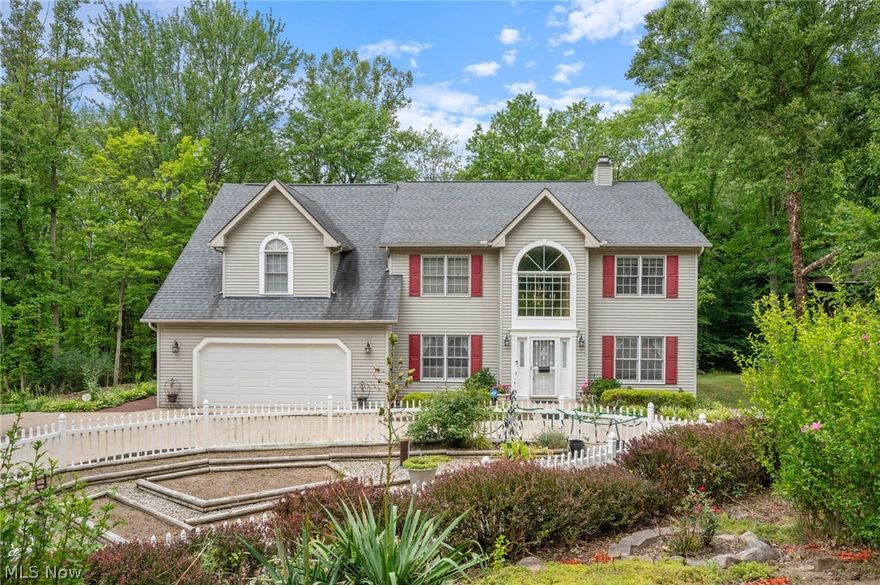 Attractive Colonial on 1.8 Acre Wooded Setting .... Circular Valet Loop Concrete Driveway ....  14' Foyer .... Spacious Rooms .... 4 Full Bathrooms .... Enormous Eat-in Kitchen (26' x 18') with Island, Huge Walk-in Pantry, 2 Wall Ovens plus Range/Oven and all Appliances .... Kitchen Includes 34' of Counterspace and Lots of Extra Cabinets and Drawers .... Very Cozy Family Room with WBFP .... Large Formal Dining Room and Living Room off Foyer ....  Large 1st Floor Utility Room with Washer & Dryer .... King Size 26' Master Bedroom ....  17' Master Bathroom with Jacuzzi Tub,, plus 4' Shower and Double Vanity ....  2nd floor Loft Ideal For Office or Lounge .... 37' Basement Rec Room with Wet Bar plus Bonus Room (Ideal for 5th Bedroom) .... Two Tier Deck .... Huge Storage Barn too