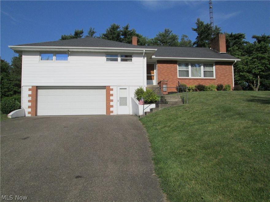 Hard to find 4 Bedroom, 2 1/2 Bath. Great area! Very well kept home with 2 fireplaces, family room and plenty of yard for outside activity.  Hard wood flooring under carpet.  Chairlift from basement to 1st floor.