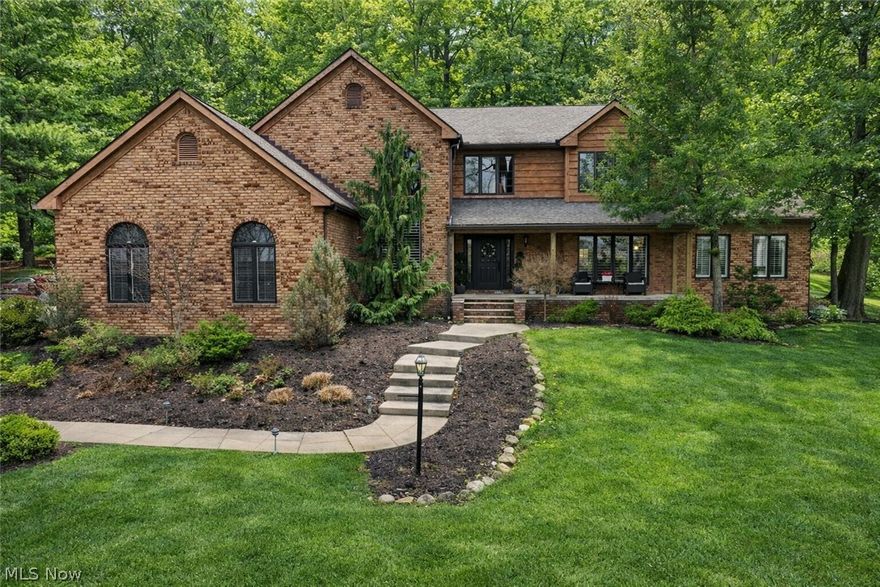 Welcome to this COMPLETELY renovated 4 BD/4.5 BA home located in the Crystal Shores development within the top-rated Revere School District. This exceptional home offers both luxury and functionality, beginning with a dramatic two-story foyer flanked by a private office & formal living room with FP, which flows into the formal dining room. The brand-new chef’s kitchen is a true showstopper, featuring a large center island, top-of-the-line appliances including 3 ovens, and an open-concept design that connects effortlessly to the inviting family room with FP. A four-seasons sunroom, with a shared see-through FP and direct access to the backyard, provides the perfect space to relax year-round. Designed for indoor & outdoor entertaining, the home offers multiple access points to the stunning outdoor living area, including a French door from the kitchen & sliders from both the family room & sunroom. Outside, you’ll find a truly unmatched setup featuring a built-in grill, custom pizza oven, fire pit, covered seating area, & multiple gathering spaces. Just off the family room, a hidden “speakeasy” creates a unique entertaining retreat with a beverage sink & 2 beverage/wine refrigerators. A half bath & laundry room complete the main level. Upstairs, the home features 4 spacious BDs and 3 full BA, including a luxurious primary suite w/2 walk-in closets and a fully renovated spa-like bathroom. The finished lower level adds even more living space with wet bar, media area, workout room, recreation space, and an additional full bath. Additional highlights include access to Crystal Lake where residents can enjoy fishing & non-motorized boating. Recent improvements include roof (approx 10 yrs, hot water tanks (2019 & 2020), new first-floor windows, and extensive interior & exterior updates, including hardwood floors, appliances, paint, lighting, landscaping, and hardscaping with custom outdoor features. This one-of-a-kind home truly has it all. Schedule your private showing today!