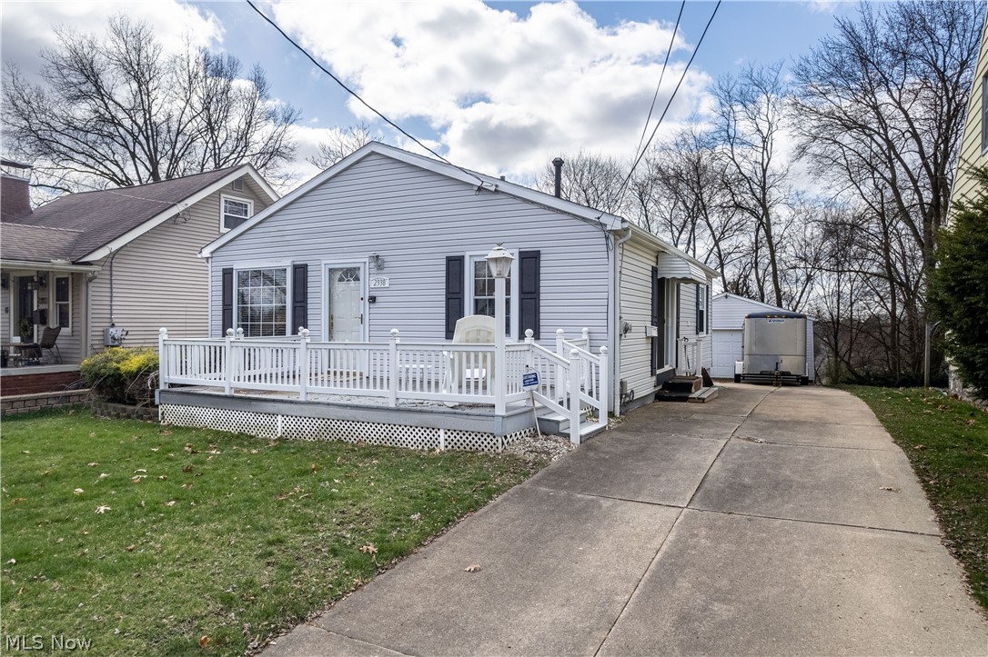You will love this cheery 3 bed , 2 bath ranch in the heart of Ellet. Enjoy the timeless beauty of gleaming OAK hardwood floors that stretch from the living room into all three of the bedrooms. Be welcomed by the spacious living room with wood plank feature wall. The eat-in kitchen easily accommodates a large dining table. Convenient first floor laundry is a wonderful plus! Be WOWED by the grand square footage of the finished lower level with a surprisingly sprawling carpeted recreation room, large separate bonus room with closet, a full bathroom and also a large strorage room. Outside you will appreciate the smooth paved driveway with additional parking pad and excellent two car garage. Take a peek behind the garage where a lovely green space awaits, perfect for a summer garden, fire pit, or room to roam for your favorite fur baby. View this charming home soon and make it YOUR home! Call me for a private showing!