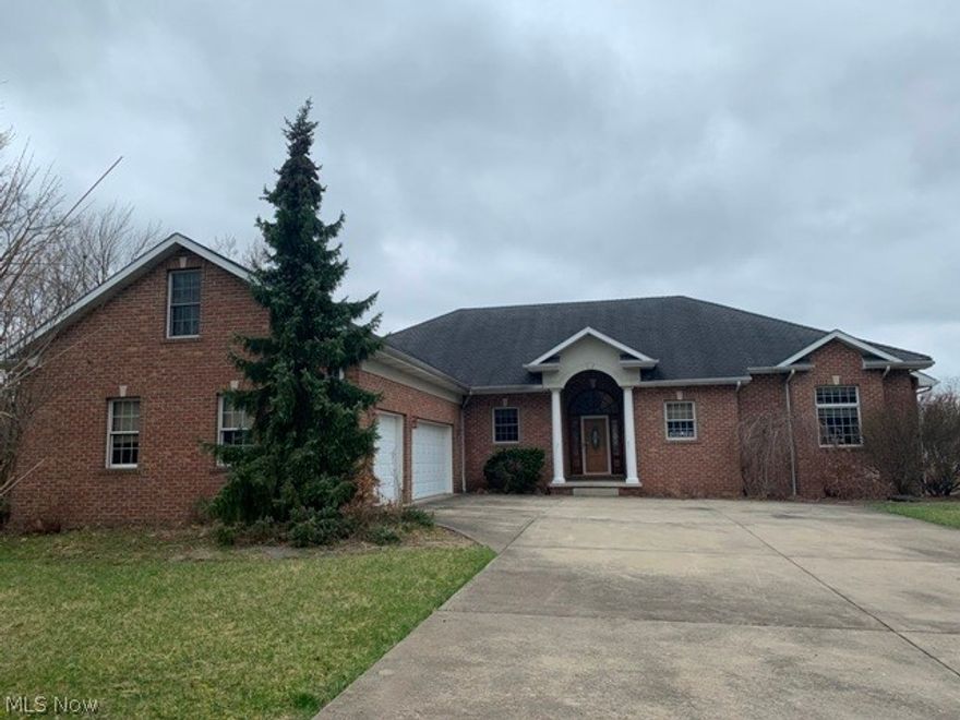 Liberty Twp, just under 1 acres. Unique L-shape ranch, with high ceilings, consist of 5 bedrooms, 4full baths. Eat in kitchen with NO warranty on the appliances, super large living rm with gas f/p, doors  to the covered porch.  Master bdrm has super large bathroom w/jetted tub & shower, bdrm doors that also goes out the covered porch.  Bdrm 2&3 share a large bathroom, Bdrm 4 & (Utility rm) are on the sides of the foyer and the attic (could be a 5th) is finished. 2 sump pumps (1NEW) in a walk-out full basement. Rear yard has a shed and is ready for a pool to be installed. Concrete double wide drive and an attached 3 car garage.  Purchasing Property "AS-IS", "WHERE IS".