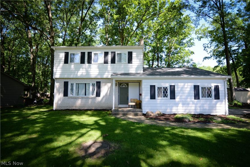 This beautiful colonial is centrally located in the heart of Canfield. With a beautiful kitchen that opens in to the family room this home has a great layout for entertaining. Boasting newer granite in the kitchen and newer flooring throughout the kitchen, living room and dining room. With hardwood throughout the second floor this home boasts 2 beautiful bedrooms and a large master bedroom with full master bath. This home has a large, partially finished basement with new Rebar as of 2017. This home also has a new hot water tank (2017). Schedule your showing today before this listing is going...going...GONE!