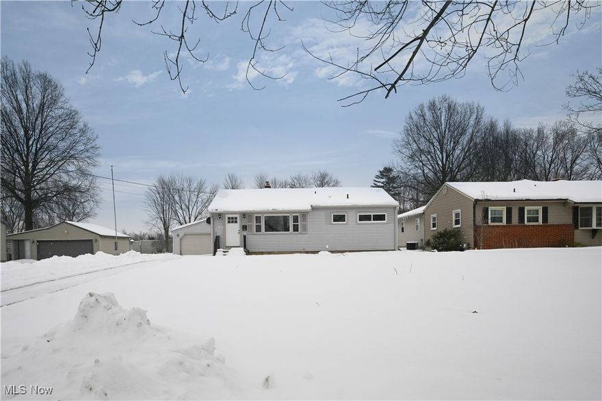 A remarkable find. This is truly a totally rebuilt and updated home on the interior. Everything is new, walls, flooring, doors, fixtures and trim. Carefully designed and tastefully finished. Neutral and elegant paint choices really flow. Main floor features a fantastic open kitchen and living room area as well as three spacious bedrooms and a full bathroom. The kitchen includes brand new quartz counter tops, new LVT flooring as well as all new appliances. Good ous new cabinets! Bring your bar stools for the breakfast bar. Luxurious vinyl flooring! The basement has been finished for you. Featuring a huge L-Shaped family room with fireplace, easily you can create two spaces with this set up and there’s a gorgeous second full bath with tasteful design and finishes. The laundry utility room has plenty of room for storage. Central air! Two car detached garage! Vinyl sided. Huge backyard! Call today, there are not many ranches with these features available here in Austintown!