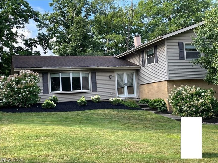 Located in Four Seasons Estates Neighborhood, this community offers a beautiful swim lake with beach, pavilion and playground. This 4 bedroom 2.5 bath home greets you with warm and inviting foyer, living room, dining room and family room with gas fireplace. Heated sunroom is accessed from the family room sliding doors which lead to backyard. Bright eat in kitchen flows into dining room with French doors out to large deck and secluded, wooded backyard with split rail fence. Kitchen offers newer stainless steel appliances and plenty of cabinets for storage. Updated bathrooms are beautiful with ceramic and travertine tile. Neutral decor throughout this cozy home that has had many things replaced and is waiting for your viewing.