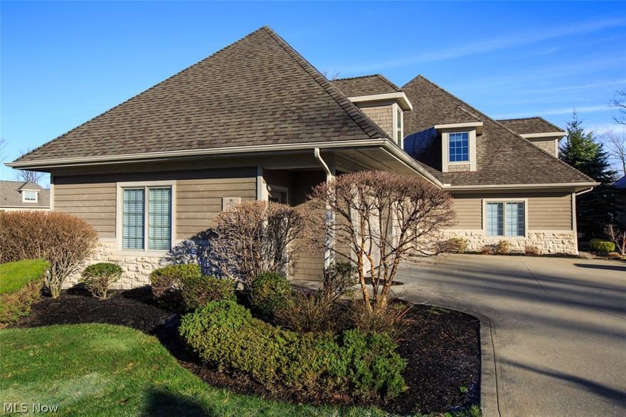 Spectacular Players Club Condo at Quail Hollow. Beautiful setting with brick paver patio overlooking the pond. Features open floor plan with nearly 2700 square feet of living space. First floor master bedroom with glamour bath. Great room, living room, and dining area all with soaring 2 story vaulted ceilings. Designer kitchen with granite counter tops and upgraded stainless appliance package. Office/den with fireplace, laundry room, loft, 2 bedrooms up, oversized 2 car garage. This condo is a true must see...absolute gem!