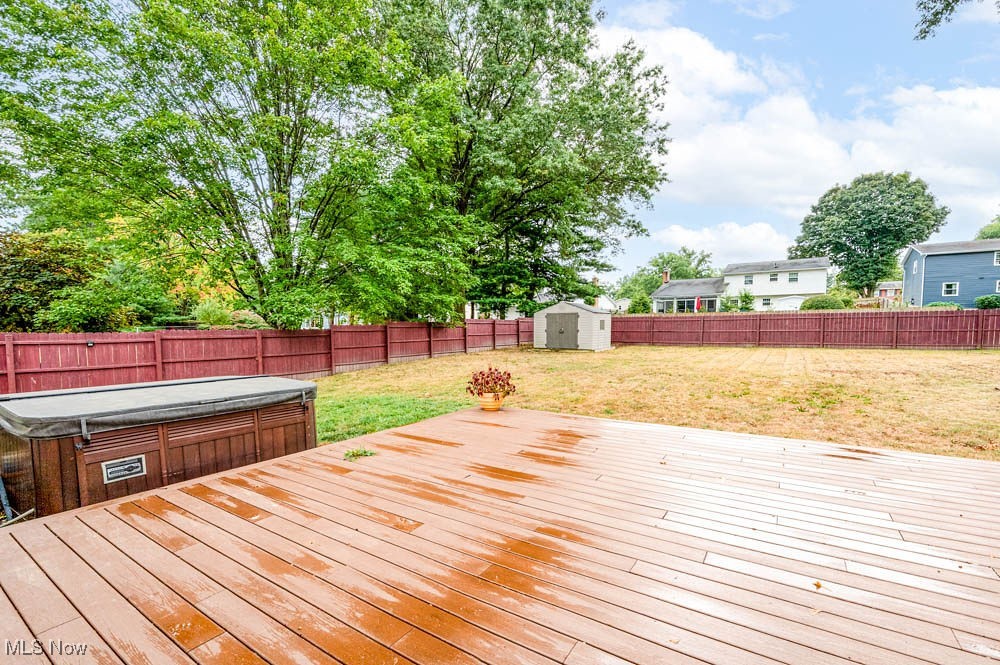Step inside this beautifully updated 3-bedroom ranch and fall in love with its charm and comfort. The spacious living room welcomes you with refinished original hardwood floors and newer patio doors, filling the home with natural light. The updated kitchen is a showstopper, featuring newer cabinets with soft-close drawers, a subway tile backsplash, sleek countertops, laminate flooring, and a generous eat-in area—plus all stainless steel appliances are included. The bathroom boasts dual vanities, a stunning tiled tub surround, and stylish tile flooring. Throughout the home, you’ll appreciate the newer interior doors and modern light fixtures. Major updates give peace of mind, including a newer furnace and central air, updated electric panel, energy-efficient windows, siding, gutters, and downspouts (all replaced in 2018), plus a newer roof (2008) and hot water tank (2013).
The lower level offers a large, open basement—perfect for a media room, family room, or home gym. Outside, you’ll love the extended concrete driveway (2024), oversized fenced backyard, and a huge 20x20 deck with hot tub (2022)—ideal for entertaining or unwinding. Updated drainage system with French drains installed in 2020. An attached one-car garage and a spacious storage shed complete the package. Don’t miss your chance to make this move-in ready gem yours!