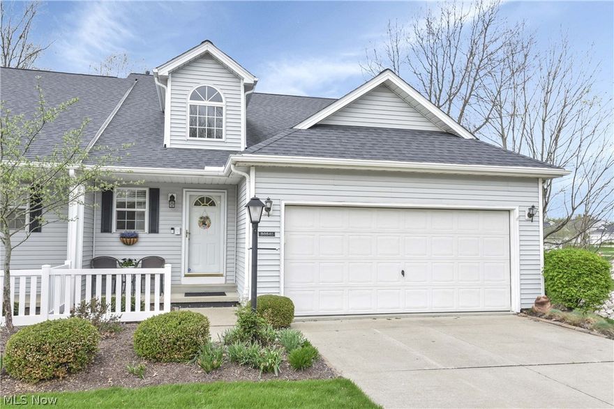 Prepare to be moved! Experience the perfect blend of elegance and ease in this stunning Cape Cod-style condominium, nestled within the highly sought-after Cinnamon Woods community. Offering over 2,200 total square feet of thoughtfully designed living space, this home features three spacious bedrooms and an impressive 3.5 bathrooms. The main level welcomes you with an expansive, open-concept living area defined by hardwood floors, soaring ceilings and a cozy fireplace, an ideal setting for both quiet evenings and formal entertaining. The well-appointed kitchen features modern finishes including granite counter tops, newer applicance and updated lighting.  It flows seamlessly into a bright dining area, where large windows flood the space with natural light. The primary suite serves as a true private retreat, complete with a full ensuite bathroom and generous closet space.  Step into comfort with freshly updated carpet throughout the versatile second level, which offers a unique sitting room and an additional bedroom, providing the perfect footprint for a home office or guest quarters. For those seeking even more room to grow, the partially finished basement includes a large recreation area, full bathroom, and abundant storage. A private outdoor retreat awaits  with half privacy fence providing quiet sanctuary to the patio. Practical amenities include a main-level laundry room and a two-car attached garage.  Roof was replaced 6 years ago. The space of a house, the ease of a condo. Claim your personal sanctuary in North Olmsted today.