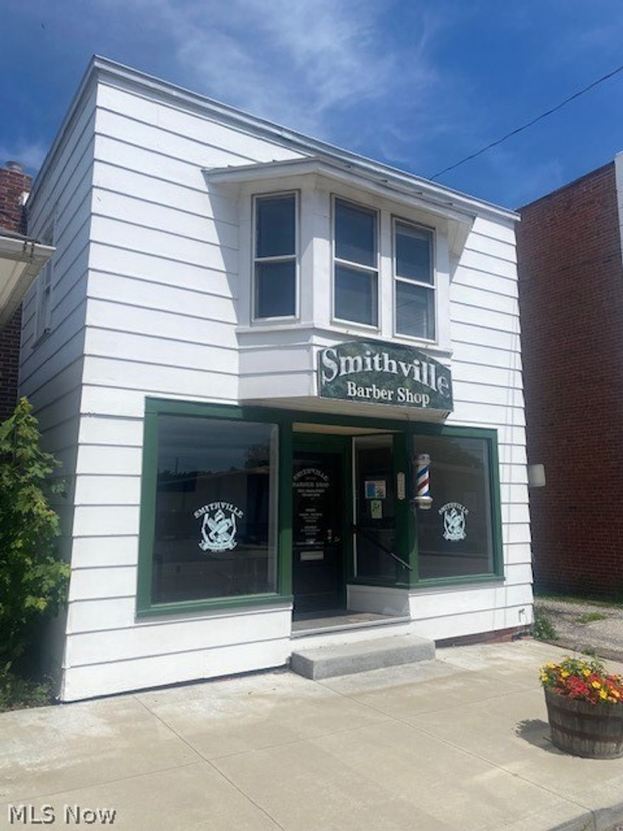 Investors here is your opportunity to purchase a property that has great visibility, a current tenant,  and potential for additional income producing space.  122 Main Street in Smithville has a a lot of possibilities.  This mixed use property currently houses a barber shop in the main floor.  The second story has a studio apartment renovation already started.  Plumbing and electric have already been completed and have passed county inspections.  You can use your creativity to complete this unique space and start collecting rent or move in.