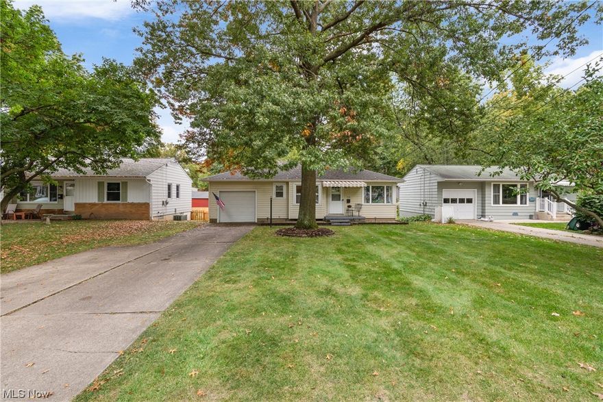 Take a look at this charming ranch near the heart of Wadsworth!!  This beauty features original hard wood floors, a large master and a finished basement! The bright airy front room flows well into the eat-in kitchen.  The kitchen eat-in kitchen has gorgeous tile floors and the stove and refrigerator remain with the property!  The bedrooms are situated toward the back of the house for maximum privacy and 2 of them have the original hard woods.  The luxurious master has 2 large closets.  Downstairs has a large family room with windows overlooking the back yard.  The basement is not only a walk-up basement to the garage, but also a walk-out to the backyard.  Super convenient! The unfinished portion also has a shower, sink and ample storage.  A private fire pit area rounds out the backyard.  To top it off, the roof is only two years old!!  This beauty will not last.  Come take a look at the OPEN HOUSE on Saturday, Sept. 30 from 12:00-2:00.