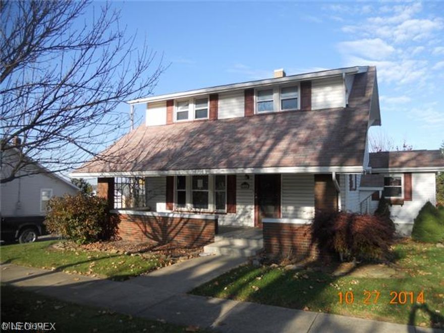 Settle into the village of Sugar Creek, the “Little Switzerland” of Ohio! 166 Mill Street SW is an attractive 2-story home with 1,352 sq. ft. on a 0.23-acre lot. Relax on your large front porch with charming brick rails, or look into the vast green field that connects to your backyard. The 3-bedroom, 1-bathroom home includes a detached garage, tidy landscaping, a roomy kitchen with wooden cabinets, a mix of hardwood and tile flooring, and a sunny dining space. Located within a mile of groceries, banks, school, and local eateries.