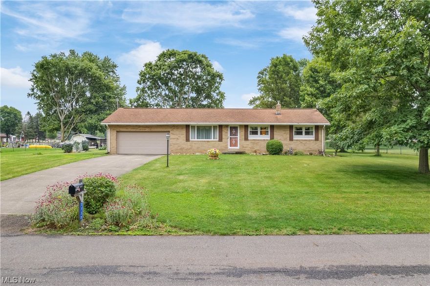 Welcome to this brick faced ranch located in desirable Plain Local School District.  This inviting abode offers three bedrooms and two full baths.  There is a jetted soaking tub in the main bathroom.  The living room is spacious and has original hardwood flooring, that is in great condition.  The eat-in kitchen boasts oak cabinetry and has a stove and refrigerator that stays with the home.  All of the bedrooms are situated on the main level.  There is a full basement which goes under the entire home which offers tons of storage space.  Enjoy summer BBQs on your back patio.  All of this plus a two car attached garage, storage shed, and the lot is over half an acre.  This home has been lovingly maintained and is awaiting a new owner. The sellers are also offering an APHW home warranty to the new buyers. Call to schedule a showing today!!