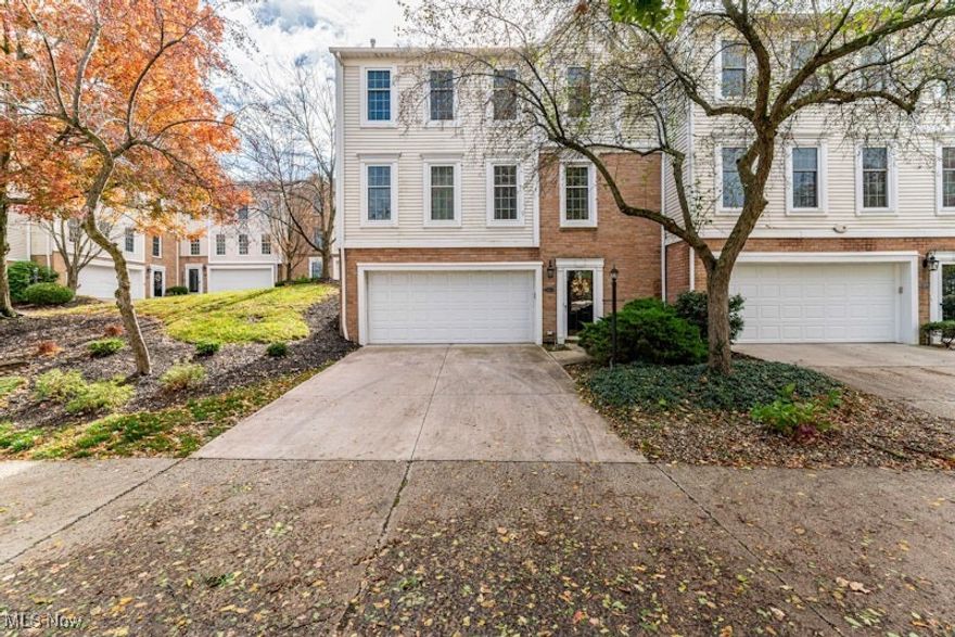 Stunning end unit townhome in Beachcliff area of Rocky River is being sold by original owner.  This light and bright home showcases substantial 2023 renovations to all 3 Baths, Kitchen and Flooring.  Plus all the windows were replaced in 2024!  Renovations include new cabinetry, stone counters, lighting, plumbing fixtures and appliances.  Plank flooring was installed on entire main floor and new carpet on top floor.  Fireplace has been dressed up and flanked with built in shelving and cabinetry.  Brand new front and storm doors were just installed this month and the door to deck was replaced in 2023.  The living room is quite large, includes three windows and is open to the dining room.   The dining room has a beautiful bay window.  The kitchen has plenty of room for a table, although current owner used the space for a cozy coffee spot.  Off that breakfast area, walk out to a new (2024) sun soaked deck with space to grill or just relax. Both bedrooms have adjacent, private full baths and there is a laundry room on the same level.  The primary bedroom is spacious and includes a walk in closet and massive updated bath with skylight and walk in shower.  This townhome has TONS of storage on every level, including a lower level dedicated storage room with sink and separate deep closet.  Deep 2 car garage is also loaded with storage options.  Convenient location in walking distance to the lake and a quick trip to all the schools and shopping areas of Rocky River.  Come make it yours!