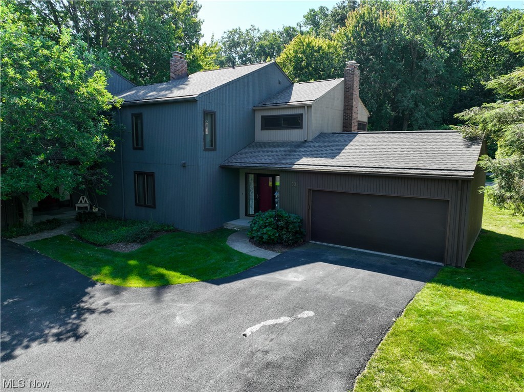 Welcome to this stunning and contemporary 3 bedroom/3 bathroom low maintenance townhouse nestled near the shore of Lake Erie in Bratenahl!. As you step inside, you'll be invited by an open and spacious floor plan, flooded with natural light by the three sliding glass doors leading out to the fenced in patio. The open floor plan effortlessly connects the living room, dining area, and kitchen, creating an ideal space for entertaining guests or enjoying quality time with loved ones. A spacious bedroom with two closets and an attached bathroom will complete the first floor. Up the floating staircase, you'll find two other generously sized bedrooms, each offering a peaceful retreat for relaxation and rest. The master bedroom boasts an en-suit bathroom, huge walk-in closet, patio doors leading to a remodeled deck, and an attached loft overlooking the first floor! Enjoy the large finished basement however you see fit. Outside, a private patio awaits, offering a serene outdoor space for enjoyi