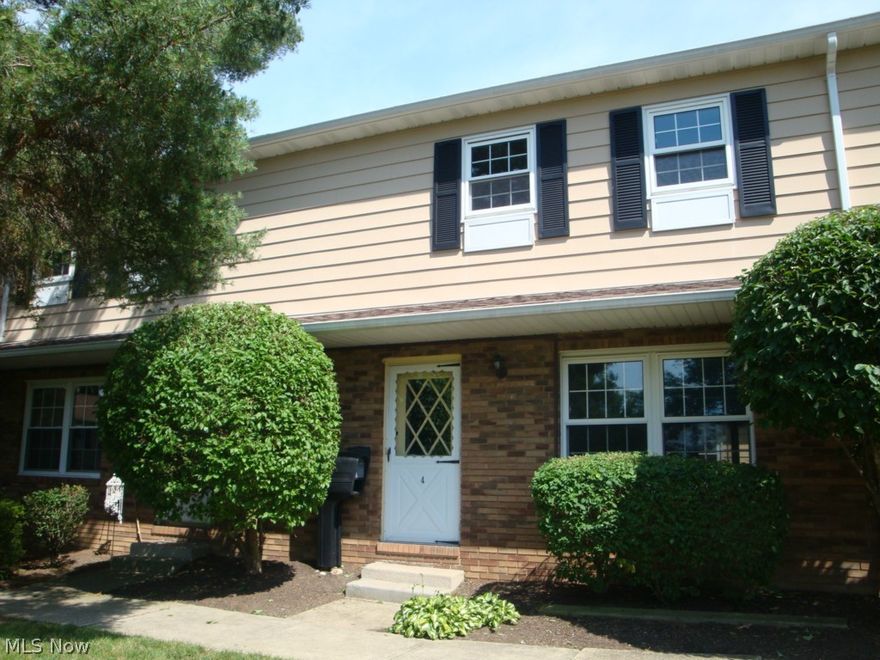 Nothing to do but move in to this 2 bedroom, 1.5 bath condo with 2 car garage. Condo is situated at the back of the development-very private and walking distance to pool and party center. Completely remodeled kitchen with bright white cabinets and granite counter tops. New dishwasher, disposal & stainless sink. Kitchen was redesigned for plenty of storage & breakfast bar. New carpet in Living room & Pergo in kitchen and dining room. Remodeled bath up. Newer hot water tan. Close to everything.