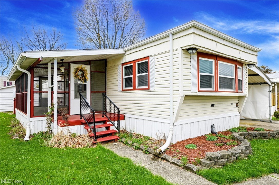 *Great Opportunity To Own A Mobile Home For Under $25,000 In A Community W/Well Kept Homes *Superb Location Next To ROUTE 21, Between Akron And Canton *This Property Features 880 Sq. Ft, 2 Bedrms & 1.5 Bathrms *Covered Concrete Driveway/Deep Carport W/Newer Side Wind & Weather Cover By A Stained Wood Stairway *Enjoy Relaxing On The 220 Sq. Ft Carpeted, COVERED, SCREENED IN PORCH ~ After Grilling Or A Hard Days Work Or Sit Outside On The Brick Patio! *Shed For Storage *Updates Include: NEW DROP CEILINGS J-U-S-T INSTALLED 5/23 In Living Rm, Kitchen & Master Bdrm, + Bdrm Light $3,650, NEW FURNACE 2020, NEW CENTRAL AIR 2021, NEW HOT WATER TANK 2022, New Fresh White BATHTUB & Rustic Modern LUXURY Plank FLOORING, Updated Vinyl Thermopane WINDOWS & More *Bdrms On Opposite Sides Of The Home For Privacy! *Walk In To A Cozy Living Rm W/View To The Kitchen Which Features LUXURY Flooring, Plenty Of Cabinets Including A Breakfast Bar W/Cabinets Above & Below ~ Fully Applianced W/A Refrigerator, St