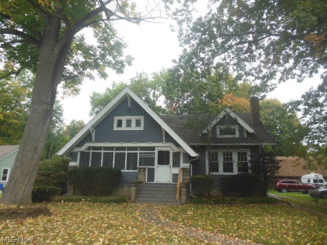 HomePath property! Large Cape Cod style home with lots of room! Full basement with plenty of storage, garage in rear, treed lot, hardwood floors and trim, first floor large laundry room, upgraded cabinets in kitchen with ceramic tile floor. New neutral carpeting, garage door, exterior paint. Plenty of cabinet and countertop space. Formal living room, dining area off kitchen, enclosed porch, plenty of room to roam! See broker remarks for more information.