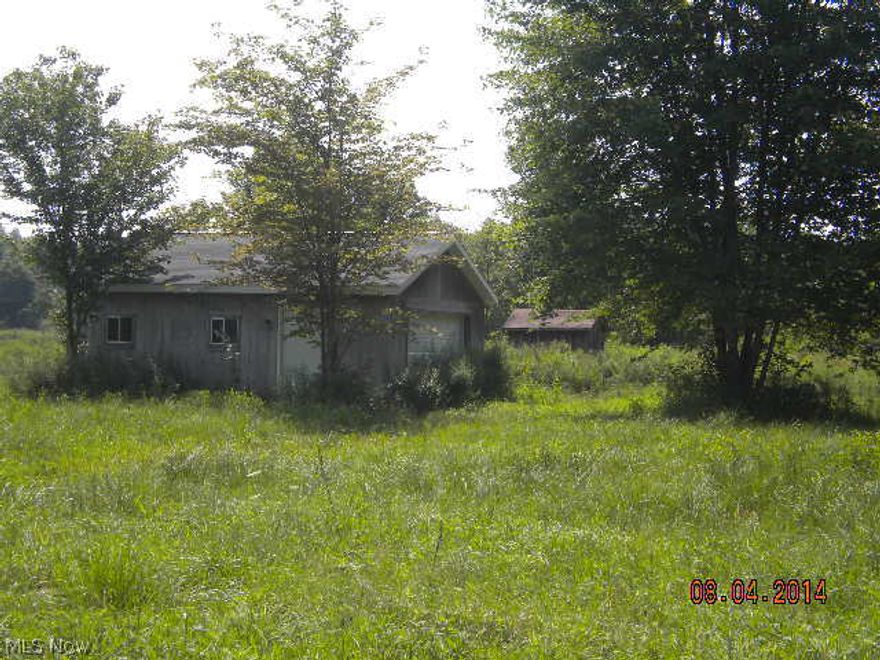 Great area for hunting or build your dream home. wooded lot with garage , has well and septic on property not hooked up yet, Garage has wood stove and electric.
