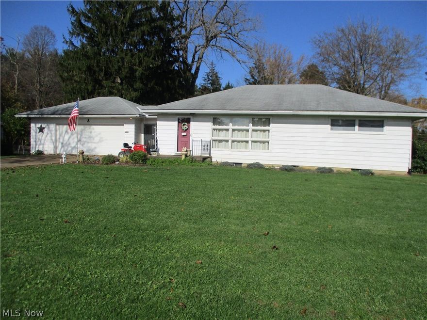 2 bedroom 3 bath house featuring large rooms throughout! 2 Large livings rooms with a wet bar off the rear living room. Both bedrooms are good sized! 1/2 acre lot that wildlife ventures through regularly. Home does need some TLC, but with your personal touches, could be exceptional!!