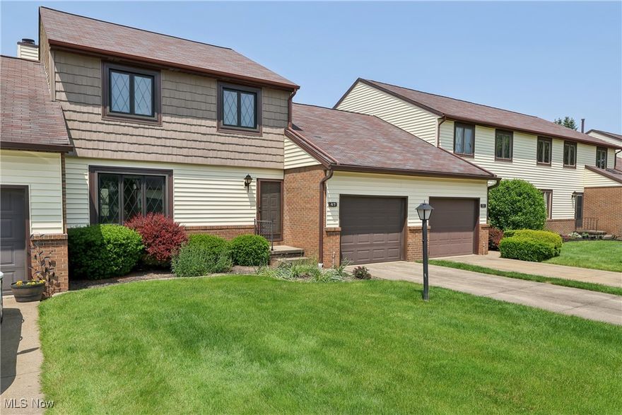 Welcome to easy living in this beautifully maintained 2-bedroom, 1.5-bath condo in a prime Kent location—just minutes from shopping, dining, and convenient highway access! The bright kitchen features a cozy eating area and flows into a formal dining room and spacious living room with a charming fireplace and built-in bookshelves, plus direct access to your private patio—perfect for entertaining or relaxing outdoors. Enjoy the privacy of vinyl fencing and the convenience of a first-floor laundry and an attached garage. Retreat to the huge primary bedroom, offering three generous-sized closets and plenty of space to create your own peaceful sanctuary. The updated main bath boasts a luxurious Jacuzzi tub, and newer carpet runs throughout the home, giving it a fresh, modern feel. Community amenities include a heated outdoor pool, clubhouse/party center, scenic lake with walking trail, fishing, and non-motorized boating. The HOA covers landscaping, snow removal, water, trash, basic cable & Wi-Fi, pest control, and exterior maintenance—giving you truly carefree living! Don't miss your chance to own this turnkey condo in an unbeatable location!