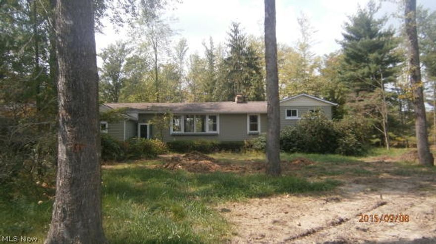 Huge split on 15 wonderful acres. Newer furnace (top efficiency) zoned with ductless system as a compliment. Newer carpet throughout, paint, flooring, electric upgraded to 220 three season room vaulted chalet type family room. Two fireplaces one with insert, two full baths, 2 car garage with pass thru to back, Large shed woods in back. Have a vacation home two miles from Lake Erie and be in vacation setting year round. This home is stunning with massive amounts of storage, and move in ready. nothing to do here but move in and enjoy. Priced below market. Home will be open Sept. 11 2015 1-3 pm. Don't miss out on this prime home.