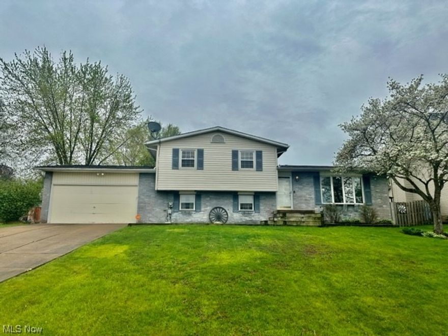 Don't miss this opportunity to own this sprawling split-level in a FANTASTIC neighborhood. Situated on a quiet dead end street, this home features large bedrooms, ample closet space, and a spacious backyard. The back deck has two levels over looking the 15'x30' above ground pool (All pool equipment stays.) The fenced in backyard is perfect for kids and/or pets, and the workshop area in the back of the garage is a perfect place for any DIY projects you decide to take on! The kitchen comes fully loaded with appliances and newer a newer washer/dryer in laundry room. The main full bath has been tastefully updated and the oversized office in the basement has 4th bedroom potential. Bring your personal touches to this house and make it your HOME!