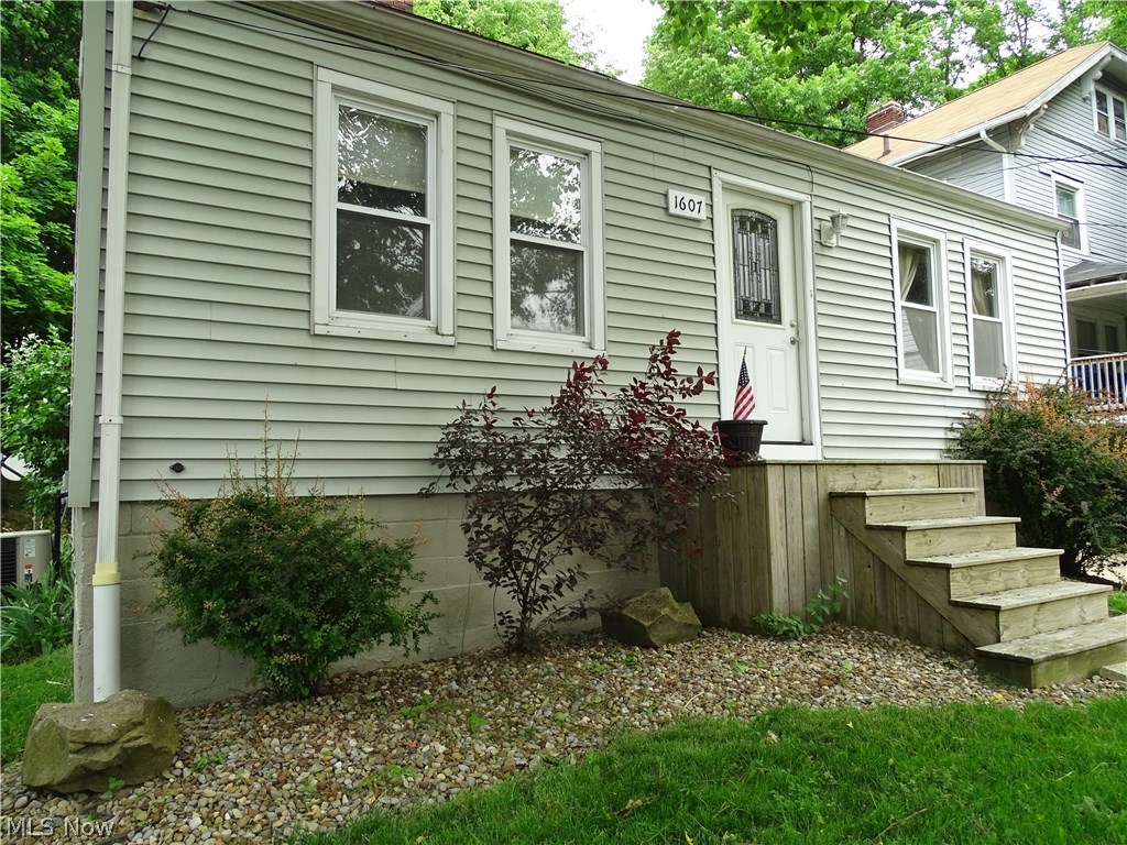 Welcome to 1607 Goodyear Blvd! This adorable 2 bedroom possible 3 bedroom, 2 bathroom home is recently updated and beautifully, well kept! The basement is fully finished with a large walk in closet and bathroom to use as your master suite. 2 bedrooms on the main floor with a full bath. Kitchen includes plenty of cabinet space with beautiful lighting. Living room has a windows for natural light and recess lighting to brighten your home. The home comes with all appliances, washer and dryer so just move right in and unpack. Updates include: New bathroom Vanity(2018), Paint throughout(2018), Carpet(2017), Replaced all lighting with LED lighting(2017), Recess Lighting(2017)