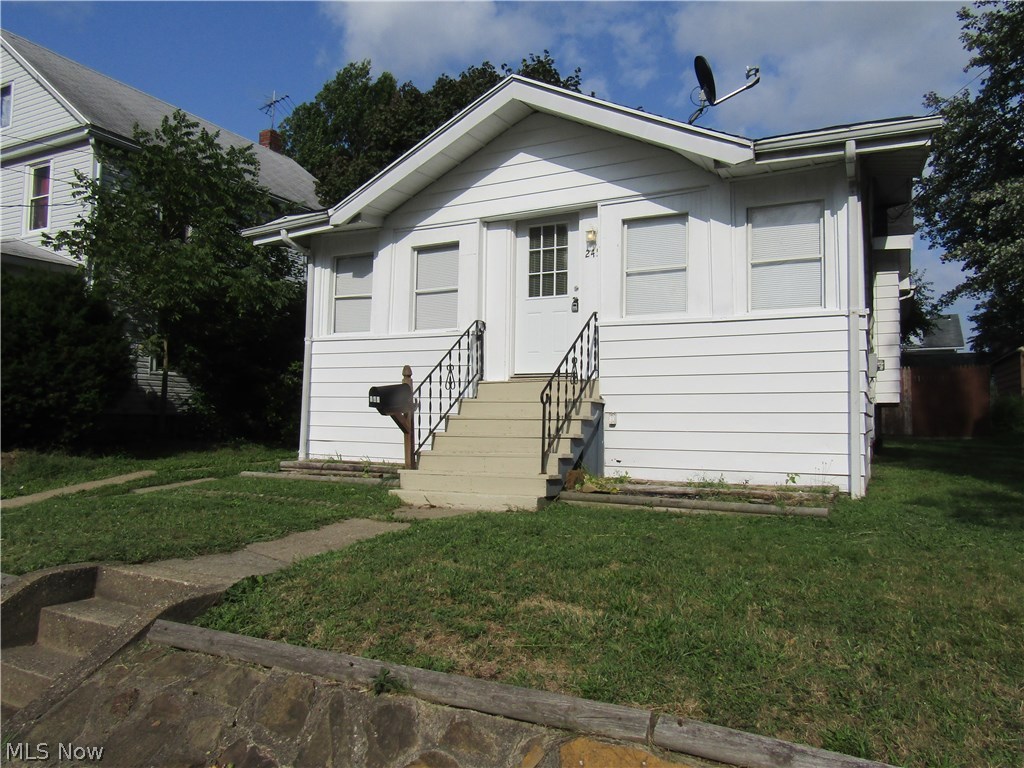 Welcome to 245 24th ST Barberton Oh. This bungalow style home is in fantastic condition and well loved by its last tenant. Complete with a privacy fenced in yard with a fire pit, the cool nights of fall are right around the corner for you to enjoy! Updates to this beautiful home are Low E Argon gas windows installed in 2016, Complete tear off and replaced roof 2016, newer paint and carpet 2016.