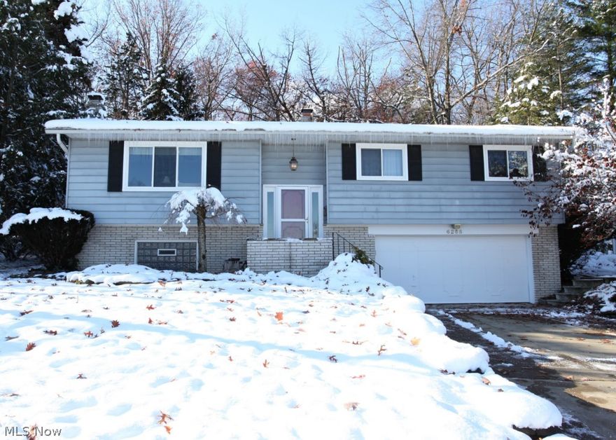 WOW! Modern, OPEN FLOOR PLAN on a Private, Cul-de Sac lot! The Kitchen is a Chef's Dream-COMPLETELY Renovated with Light Cherry Cabinets, Corian Counters, Ceramic Tile Backsplash, Stainless Steel Appliances that ALL STAY & a Breakfast Island with Storage & Seating for 4! (Island Chairs Stay too!) Recent Renovations Created a Modern Open Floor Plan between the Kitchen, Living Room & Dining Room with Gleaming, Brazilian Cherry Hardwood Floors! French Doors off the Dining Room Lead to the Real Bonus on the Main Level: A Vaulted 4 Season Heated & Air Conditioned 21x14 Sun Room! The Lower Level has a Huge Family Room with a Wood Burning Fireplace & an Office Area for Additional Living & Entertaining Space plus a Laundry Room & Storage Area! A Private Oasis Awaits you Outside with a Yard that backs up to Woods & has a Large Deck & Large Paver Patio Area that are both Perfect for Entertaining. Storage Shed & Playset in the Backyard Remain with the Home too! 2 1/2 Car HEATED GARAGE has Additio